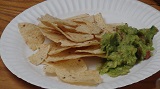 guacaMOLE and nacho chips